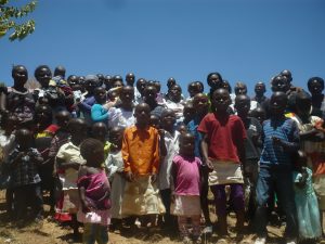 Children of the Eldoret community gathered together outdoors
